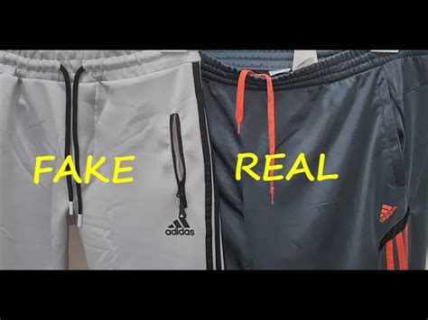 fake adidas tracksuits|how to identify adidas products.